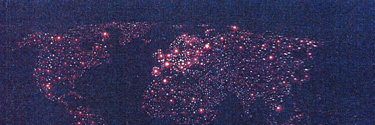 Weltkarte bei Nacht aus rot und weiß leuchtenden Lichtpunkten auf dunkelblauem Grund (Buchrückseite)